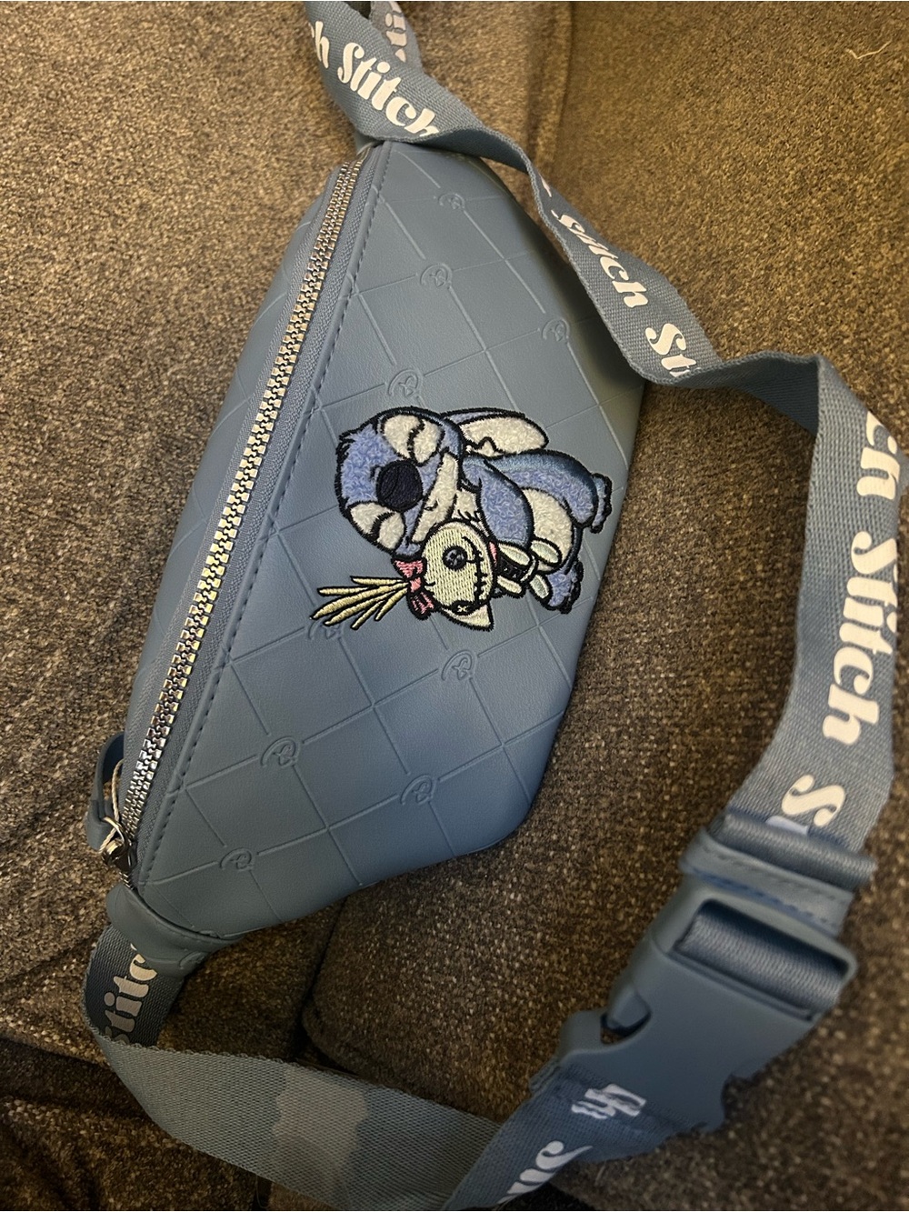 Light Blue Quilted Crossbody Bag with Logo Strap